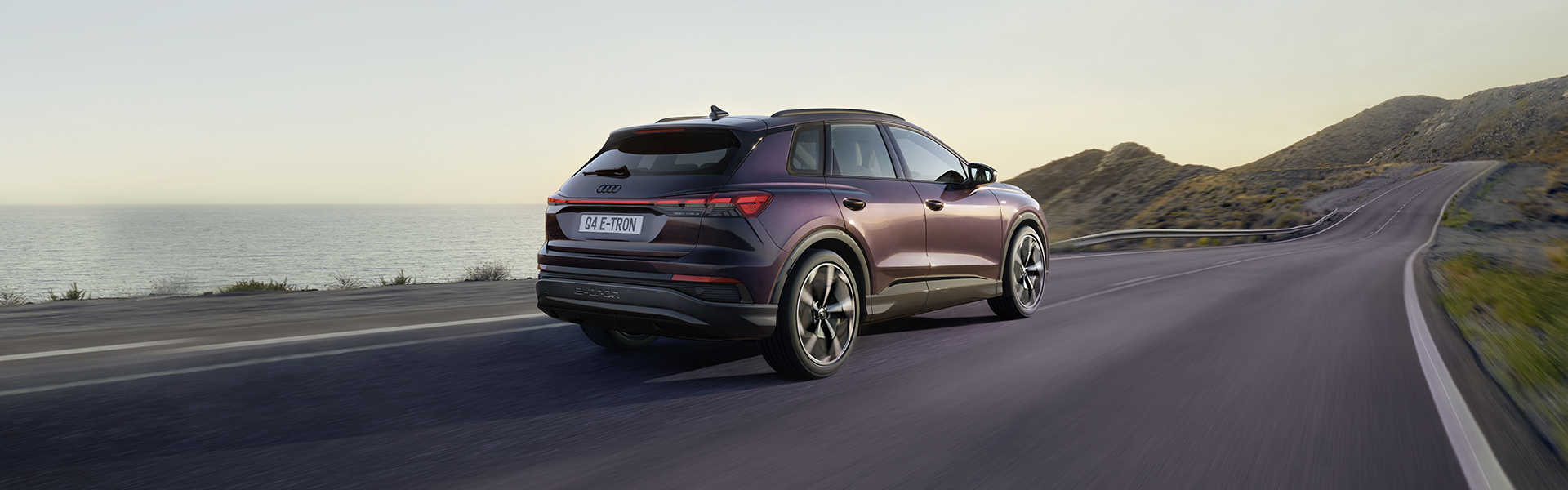 Audi Q4 e-tron driving on open road